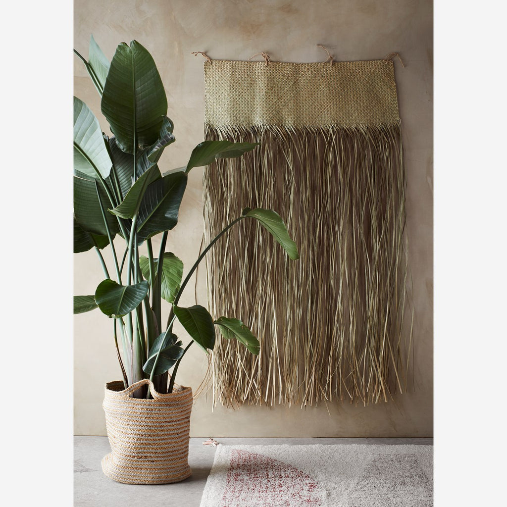 Tufted cotton rug w/ tassels