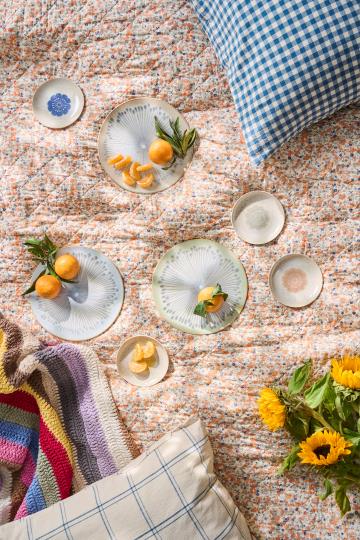 Ib Laursen Quilt w/orange and blue flowers