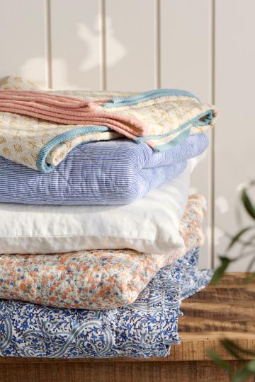 Ib Laursen Quilt w/orange and blue flowers