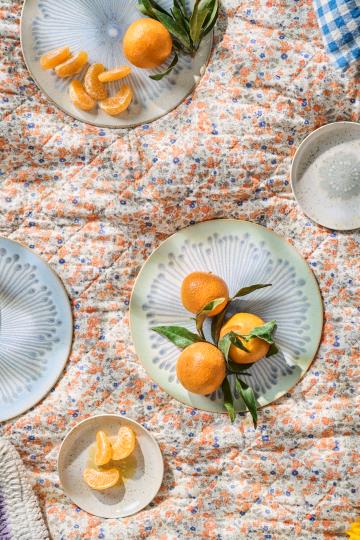 Ib Laursen Quilt w/orange and blue flowers