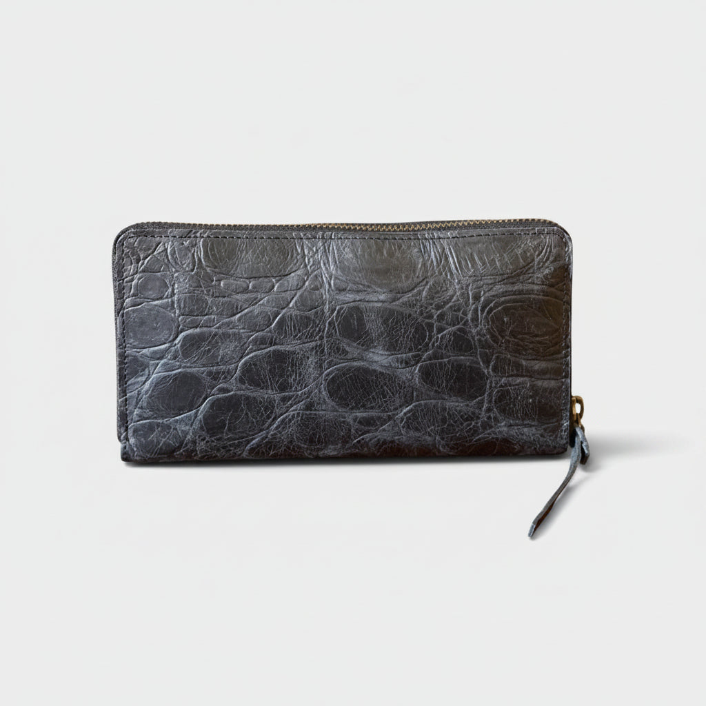 Black textured wallet on a white background
