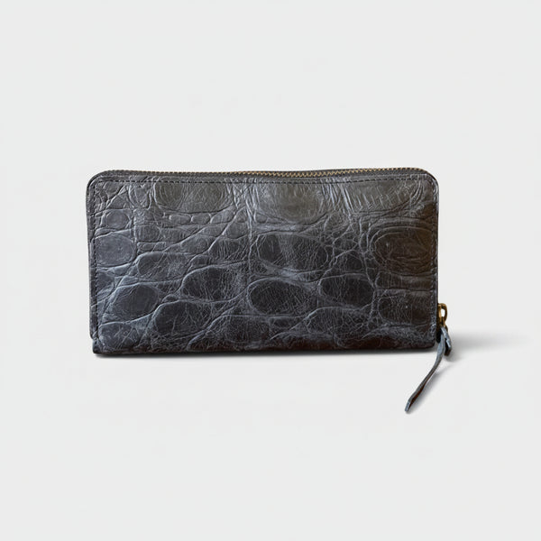 Black textured wallet on a white background
