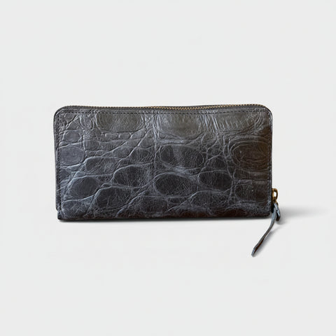 Black textured wallet on a white background