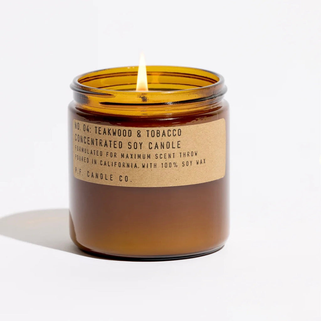 Scented candle with a label on a white background