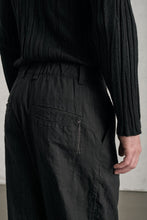 Transit Loose-fit tobi trousers in mottled pinstriped cotton blend with hand embroidery on the back pocket