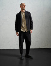 Transit Loose-fit tobi trousers in mottled pinstriped cotton blend with hand embroidery on the back pocket